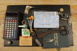 A SMALL BOX OF COLLECTABLES TO INCLUDE AN EARLY COMMODORE CALCULATOR