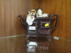 A NOVELTY ROYAL ALBERT OLD COUNTRY ROSES TEAPOT IN THE FORM OF AN AGA