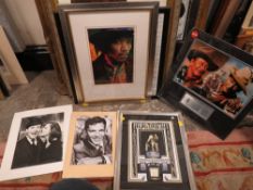 A LARGE QUANTITY OF FRAMED MEMORABILIA - CHARLIE CHAPLIN ,BUDDY HOLLY, ELVIS PRESLEY ETC (9)
