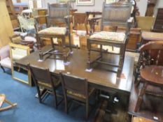 LARGE PRIORY STYLE OAK DRAWER LEAF REFECTORY TABLE AND SIX CHAIRS