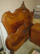A FRENCH ANTIQUE CARVED DOUBLE BED FRAME WITH IRONS AND BASE - W 154 cm