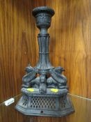 A UNUSUAL BLACK BASALT STYLE ALLOY LAMP BASE FEATURING TWO GRIFFINS ON PIERCED LATTICE PLINTH A/F