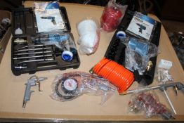 A QUANTITY OF AIR TOOLS TO INCLUDE A BOXED AIR CHISEL, A BOXED IMPACT WRENCH AND TWO SPRAY GUNS