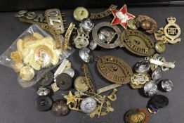 A BOX OF MILITARY AND OTHER BADGES