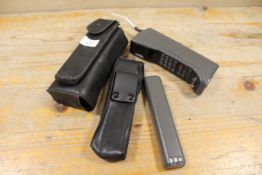 A VINTAGE MOTOROLA 8500X MOBILE PHONE WITH SPARE BATTERY