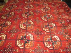 A HAND KNOTTED WOOLLEN RUG 114 X 168 CM