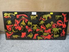 A MACK WALSH-HOLE - A MODERNIST STUDY OF COLOURED ANIMALS IN RELIEF ON HARDWOOD