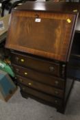 A SMALL REPRODUCTION MAHOGANY BUREAU - W 52 cm