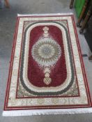 A MODERN SILK RUG 184 X 121 cm