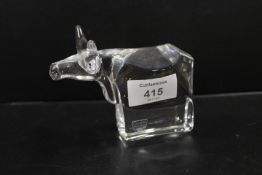 AN ORREFORS CLEAR GLASS FIGURE OF A BULL