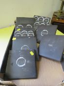 A TRAY OF UNUSUAL BLACK TILES INITIALLED WITH W AND B