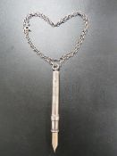 AN ANTIQUE SILVER EXTENDING PENCIL BY SAMSON MORDEN ON SILVER CHAIN