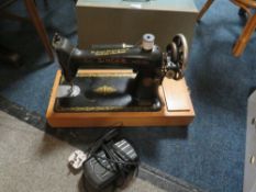 A VINTAGE CASED SEWING MACHINE NO Y8316183