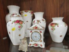 A SMALL COLLECTION OF ROYAL ALBERT OLD COUNTRY ROSES VASES, PLUS A CLOCK AND A ROYAL DOULTON MODEL