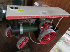 A MAMOD STEAM TRACTOR TOGETHER WITH A MAMOD POLISHING WHEEL