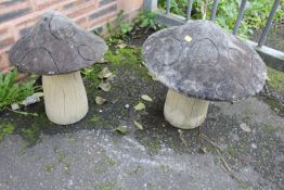 TWO CONCRETE ORNAMENTAL GARDEN MUSHROOMS