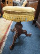 A VICTORIAN REVOLVING PIANO STOOL