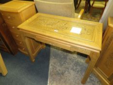 A MODERN CARVED CONSOLE TABLE WITH GLASS TOP
