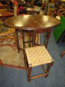 AN OAK BARLEYTWIST TABLE PLUS AN OAK STOOL (2)