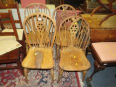 A SET OF FOUR ELM? WHEELBACK CHAIRS