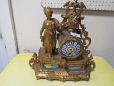 A FRENCH STYLE GILT METAL AND ENAMEL MANTLE CLOCK