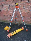 A TOPCON AT-F6 AUTO SURVEYORS LEVEL WITH TOPCON WOODEN TRIPOD AND AN ALUMINIUM TRIPOD