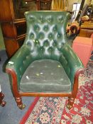 A 19TH CENTURY MAHOGANY LIBRARY ARMCHAIR WITH LEATHER BUTTON BACK UPHOLSTERY