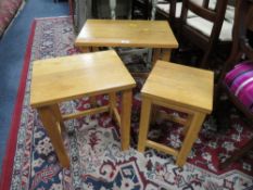 A MODERN OAK NEST OF TABLES