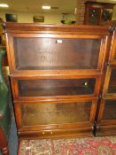 A VINTAGE OAK THREE STAGE GLOBE WERNICKE STYLE BOOKCASE - H 125 cm, W 87 cm