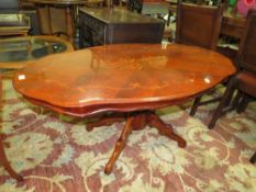 AN ITALIAN STYLE OCCASIONAL TABLE