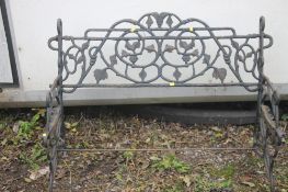 A CAST IRON GARDEN BENCH FRAME