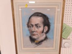 A FRAMED AND GLAZED PASTEL PORTRAIT OF A GENTLEMAN SIGNED AND DATED LOWER LEFT 