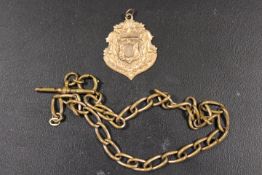 A VINTAGE GOLD PLATED WATCH CHAIN WITH T-BAR, TOGETHER WITH A LARGE 18CT GOLD PLATED FOB