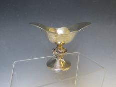 A HALLMARKED SILVER PEDESTAL DISH - BIRMINGHAM 1976, the column moulded as a flower, H 9 cm