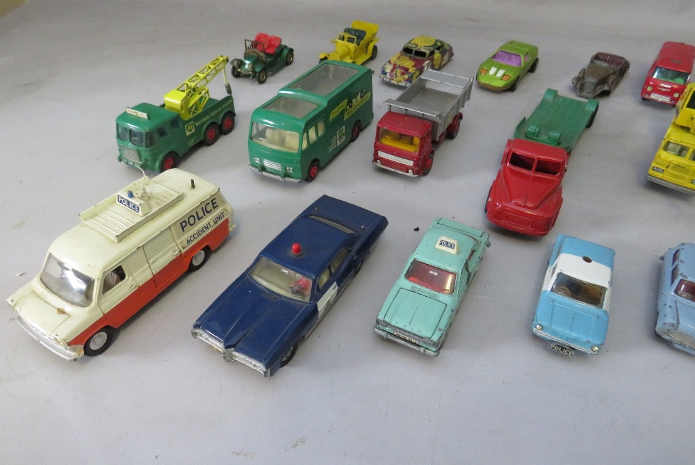 A COLLECTION OF VINTAGE PLAYWORN VEHICLES TO INCLUDE DINKY POLICE FORD TRANSIT VAN, Dinky Pontiac - Image 2 of 9