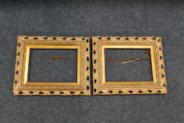 A PAIR OF 19TH CENTURY GOLD DECORATIVE PIERCED FRAMES, frame W 5 cm, slip rebate 20 x 28 cm, frame