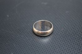 A HALLMARKED 18 CARAT GOLD WEDDING BAND, approx weight 5.6g, ring size M