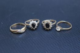 FOUR ASSORTED 9 CARAT GOLD DRESS RINGS, set with CZ's etc., approx combined weight 7.4g