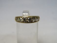 A LADIES 18CT GOLD SEVEN STONE DIAMOND RING, approximately 1 carat in total