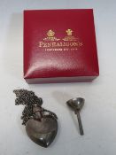 A BOXED PENHALIGON'S HEART SHAPED PERFUME BOTTLE PENDANT, the bottle marked 925, complete with