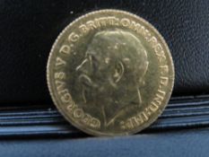 GEORGE V 1913 HALF SOVEREIGN - POSSIBLY A JEWELLERS COPY, weight 4 g