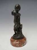 A 19TH CENTURY BRONZE STUDY OF A SATYR, signed 'Clodion' to treestump, H 16 cm