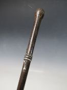 A 19TH CENTURY PALMWOOD WALKING STICK, with applied white metal snake, overall L 89 cm