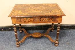 A WILLIAM AND MARY STYLE WALNUT OYSTER VENEERED AND INLAID SIDE TABLE, the top having elaborate