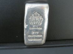 A SCOTTSDALE MINT, LIONS HEAD, 100 g .999 FINE SILVER BAR