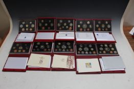 A COLLECTION OF TEN ROYAL MINT DELUXE CASED DECIMAL COIN SETS - 1990 THROUGH TO 1999