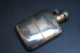 A SMALL HALLMARKED SILVER HIP FLASK - SHEFFIELD 1937, approx weight 110g, H 10 cm