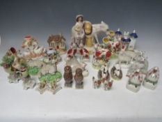 A COLLECTION OF ASSORTED STAFFORDSHIRE ANIMALS, to include cats, rabbits, cottages etc (Tray)