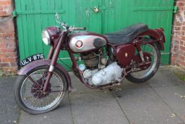 A 1956 BSA B33 MOTORCYCLE IN MAROON PAINTWORK, with chrome side tank,, 500cc engine with Amal carbur