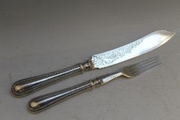 A HALLMARKED SILVER KNIFE AND FORK SET - BIRMINGHAM 1866, makers mark J.G., probably that of John